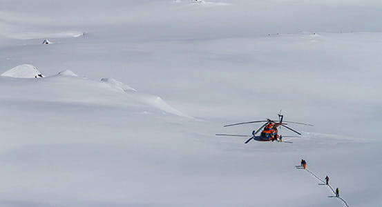 Heli-skiing.