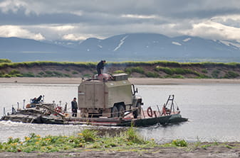 Crossing the Opala River by ferry