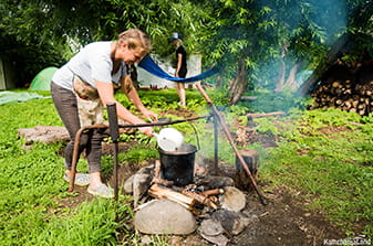 camping on the Paužetka River on tour