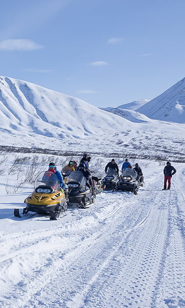 driving a snowmobile.