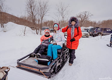 the group sets off on snowmobiles